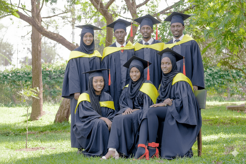 Graduation celebration with graduates in caps and gowns